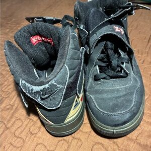 Jordan Black and Gold Sneakers